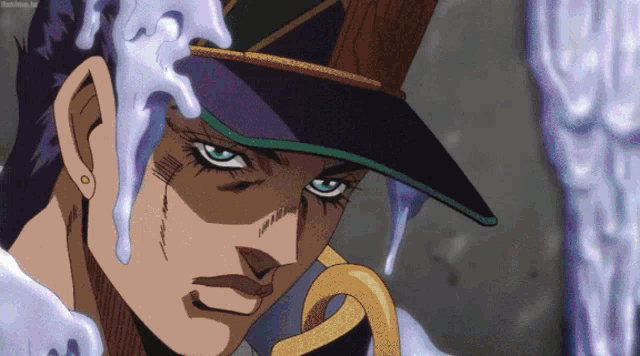 a close up of a cartoon character 's face with a few drops of liquid on it