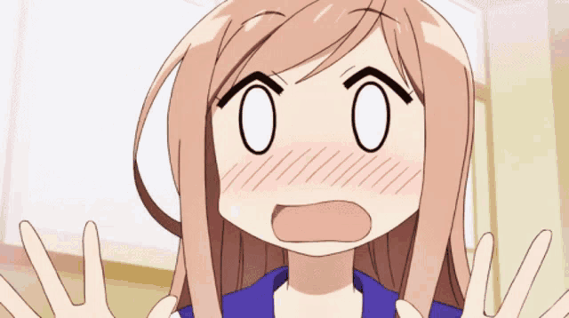 a girl with a surprised look on her face has her eyes closed