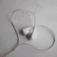 a pair of ear buds in the shape of a heart with the words listen to your heart written on it .