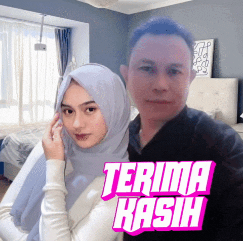 a man and a woman are posing for a picture with the words terima kasih on the bottom right