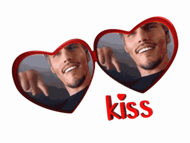 two red hearts with a picture of a man and the word kiss below it