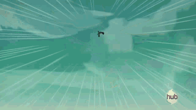 a purple robot is flying through the air with a hub logo on the bottom