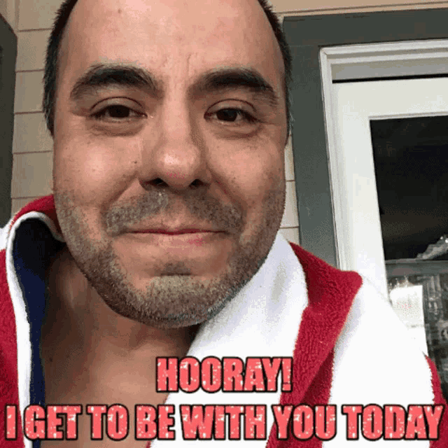 a man with a beard and a towel around his neck says " hooray ! get to be with you today "