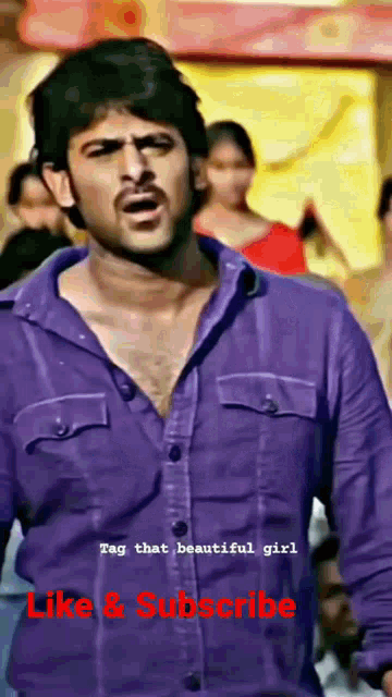 a man in a purple shirt says tag that beautiful girl