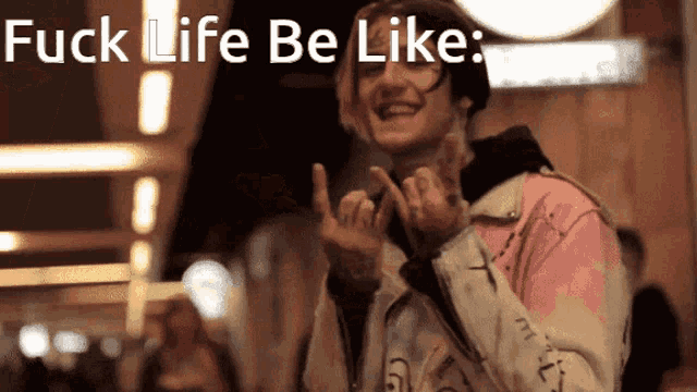 a man giving the middle finger with the words fuck life be like