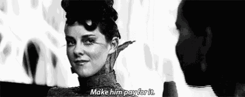 a woman is talking to a man in a black and white photo and saying `` make him pay for it '' .