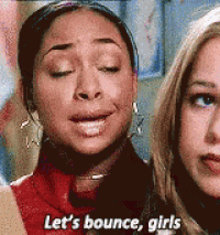 two women are standing next to each other and one of them says let 's bounce girls .