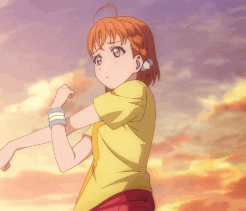 a girl with orange hair and a yellow shirt with a cross on it