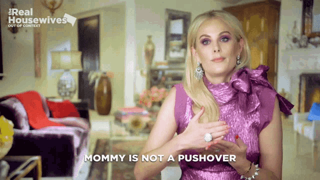 a woman says mommy is not a pushover in front of a living room