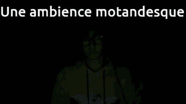 a man wearing headphones in the dark with the words une ambience motandesque