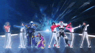 a group of cartoon characters are standing next to each other on a stage