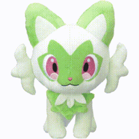 a green and white stuffed animal with pink eyes is standing on a white background
