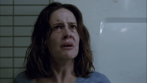 a woman with tears coming out of her eyes