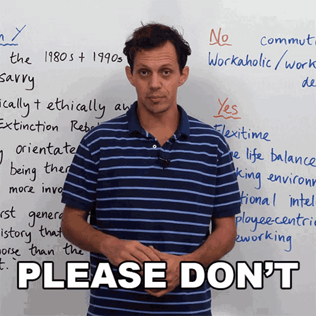 a man standing in front of a white board with the words please don 't written on it