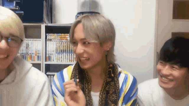 a man with a scarf around his neck that says ' i love you '