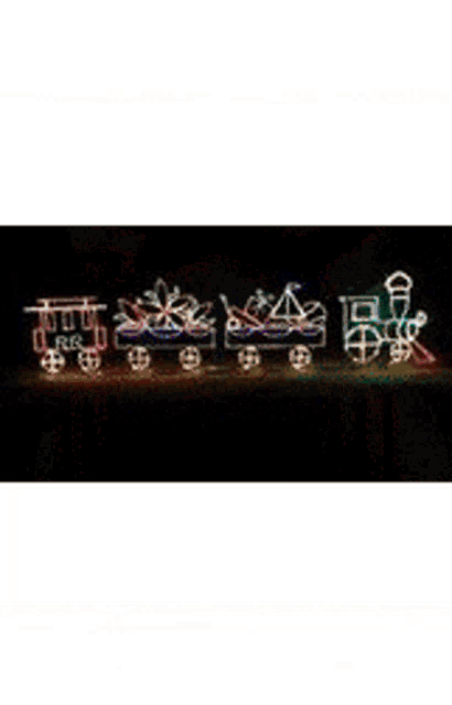 a christmas decoration with the word joy and two angels
