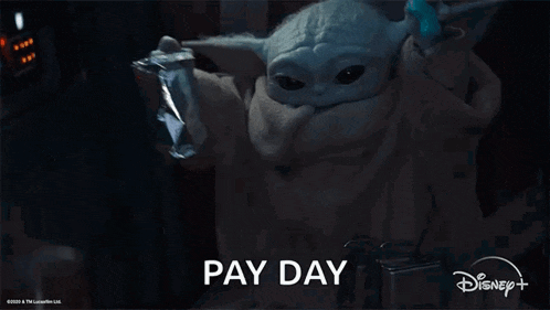 a baby yoda from the mandalorian is holding a bag of food and saying pay day .