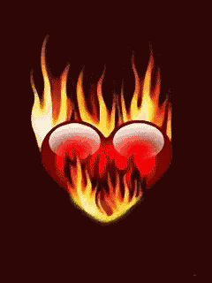a red heart is on fire with flames coming out of it