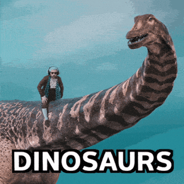 a picture of a man sitting on top of a dinosaur with the word dinosaurs underneath it