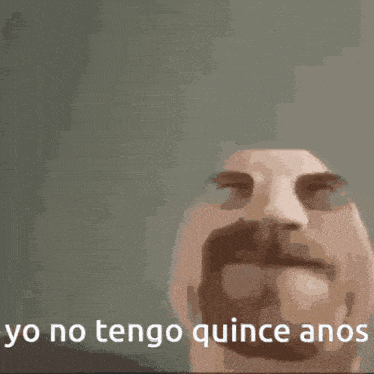 a man with a mustache says yo no tengo quince anos in front of him