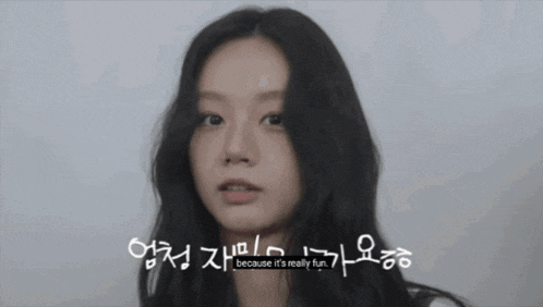 a close up of a woman 's face with the words because it 's really fun behind her