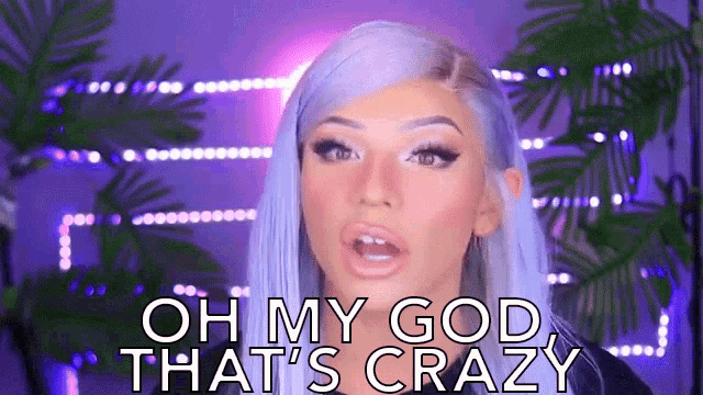 a woman with blue hair is saying oh my god that 's crazy ..