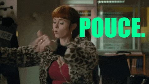 a woman in a leopard print jacket with the word pouce in green