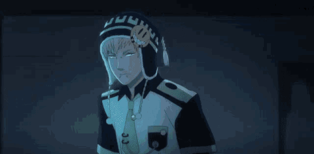 a man with a crown on his head is wearing a black and white outfit