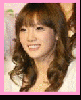 a close up of a woman 's face with brown hair and a pink frame .