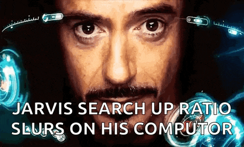 a close up of a man 's face with the words jarvis search up ratio slurs on his computor