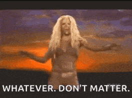 a woman in a bikini is dancing in front of a sunset and says `` whatever . don 't matter . ''