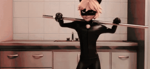 a cat noir from miraculous ladybug is holding a stick over his head in a kitchen .