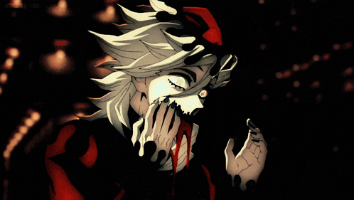 a close up of a person 's face with blood coming out of his mouth