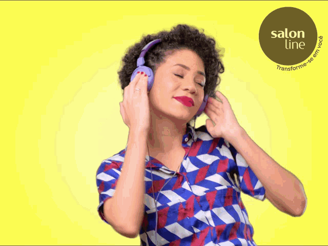 a woman wearing headphones with salon line written on the bottom