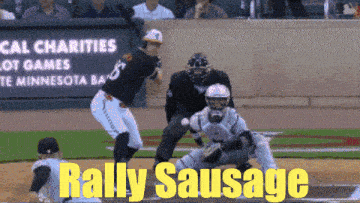 a baseball player is swinging at a ball with the words rally sausage behind him