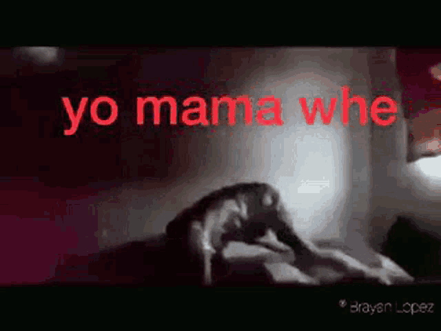 a picture of a person laying on a bed with the words yo mama whe in red letters