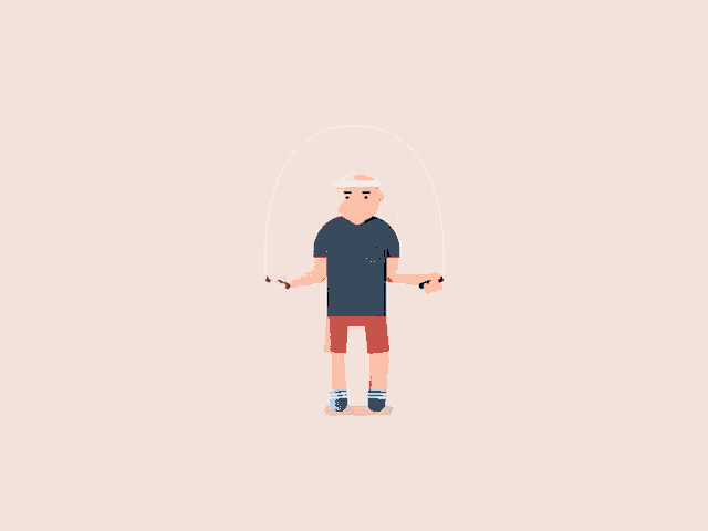 a man is jumping a jump rope with a headband on his head
