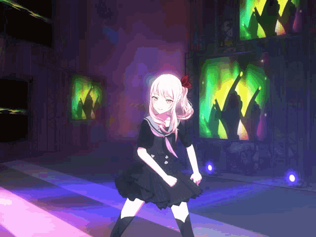 a girl in a black dress with a red flower in her hair is dancing