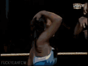 two women wrestling in a ring with the words fuckyeahfcw on the bottom right