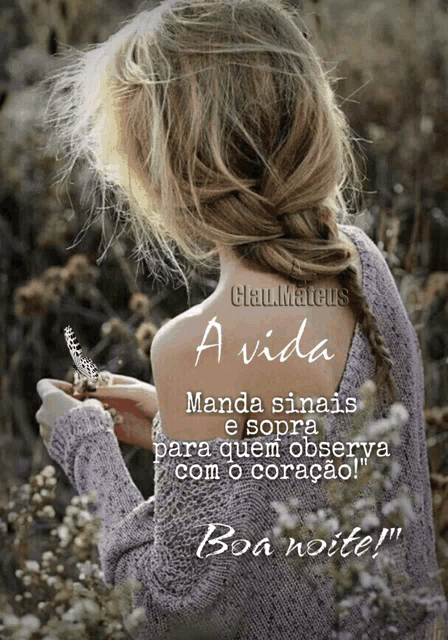 a woman in a sweater is holding a flower with the words " a vida manda sinais e sopra para quem observe "