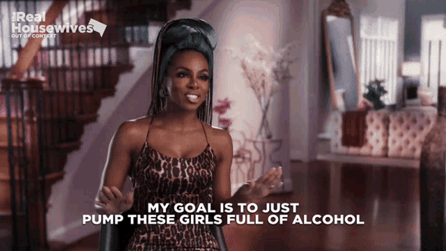 a woman in a leopard print dress is talking about her goal to just pump these girls full of alcohol