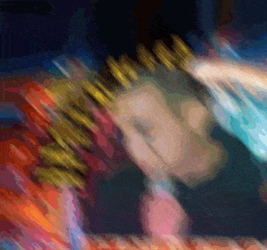 a blurry picture of a person 's face with a crown on it