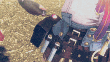 a close up of a person 's waist with a belt that has the letter e on it