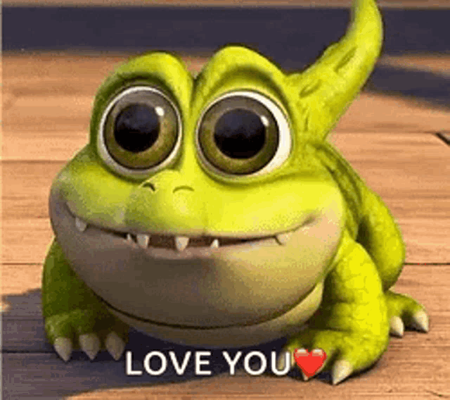 a cartoon frog with big eyes is sitting on a wooden floor and saying `` love you '' .