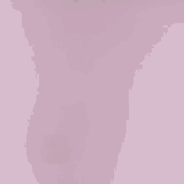 a laptop is sitting on a pink surface next to a flash drive