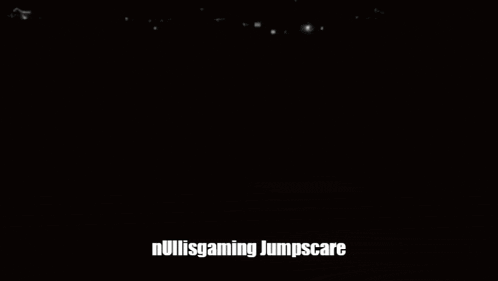a man wearing glasses and a beanie says nullisgaming jumpscare