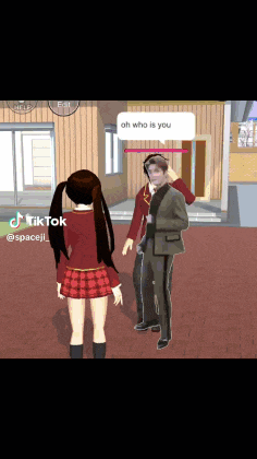 a girl in a red skirt is standing next to a man in a suit in a video game .
