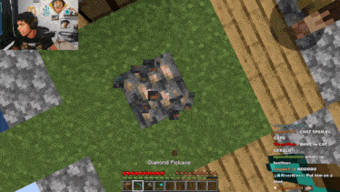 a screenshot of a video game with a diamond pickaxe in the middle