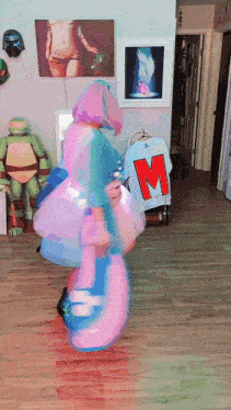 a person in a costume with a shirt that says m