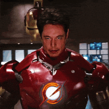 a man in a red suit with a lightning bolt on the chest